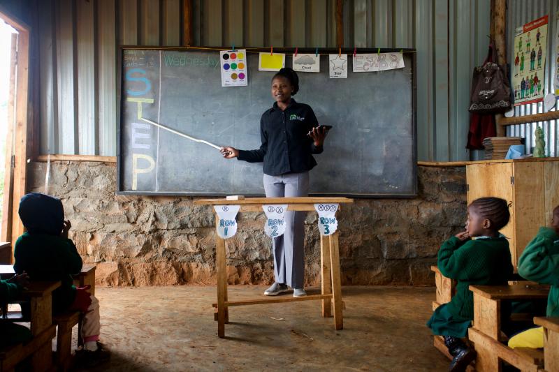 A teacher at the Bridge International Academy school in Kinoo, near Nairobi, Kenya, gives a lesson to young students. Bridge, a private, for-profit company, has set up more than 200 schools in the country. A teacher at the Bridge International Academy school in Kinoo, near Nairobi, Kenya, gives a lesson to young students. Bridge, a private, for-profit company, has set up more than 200 schools in the country.