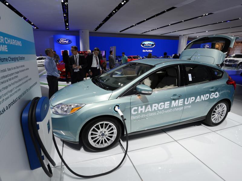 A Ford Focus electric concept car with a home charging unit on display at the 2013 North American International Auto Show in Detroit, Mich., in January. A Ford Focus electric concept car with a home charging unit on display at the 2013 North American International Auto Show in Detroit, Mich., in January.