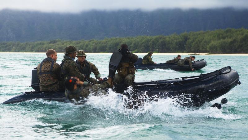 U.S. Marines with 4th Force Reconnaissance Company slide off F470 Combat Rubber Raiding Crafts during training in Waimanalo, Hawaii. The French company Zodiac has been the U.S. military's choice for inflatable rubber rafts for roughly two decades. Now the U.S. Marines with 4th Force Reconnaissance Company slide off F470 Combat Rubber Raiding Crafts during training in Waimanalo, Hawaii. The French company Zodiac has been the U.S. military's choice for inflatable rubber rafts for roughly two decades. Now the