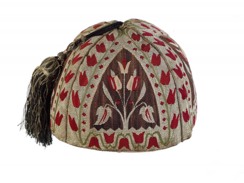 The silken tassel on this skull cap, woven in Aleppo around 1800, recalls a more prosperous and tranquil time in that now-beleaguered Syrian hub. The silken tassel on this skull cap, woven in Aleppo around 1800, recalls a more prosperous and tranquil time in that now-beleaguered Syrian hub.