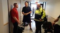 Marine Sgt. Maj. Damion Jacobs (left) and Marine Capt. Cam West visit with Boston emergency workers who responded to the bombings at the Boston Marathon. Marine Sgt. Maj. Damion Jacobs (left) and Marine Capt. Cam West visit with Boston emergency workers who responded to the bombings at the Boston Marathon.