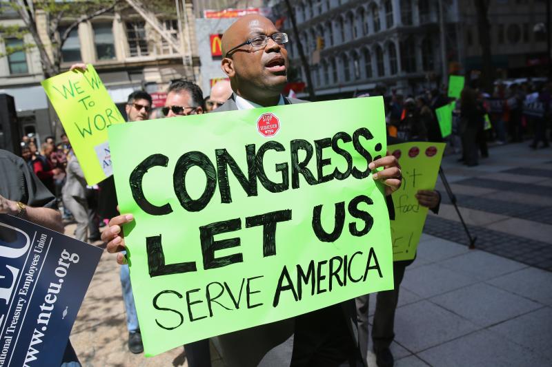 Federal employees demonstrate against the U.S. budget sequester, outside New York's Federal Plaza on Tuesday. Federal employees demonstrate against the U.S. budget sequester, outside New York's Federal Plaza on Tuesday.