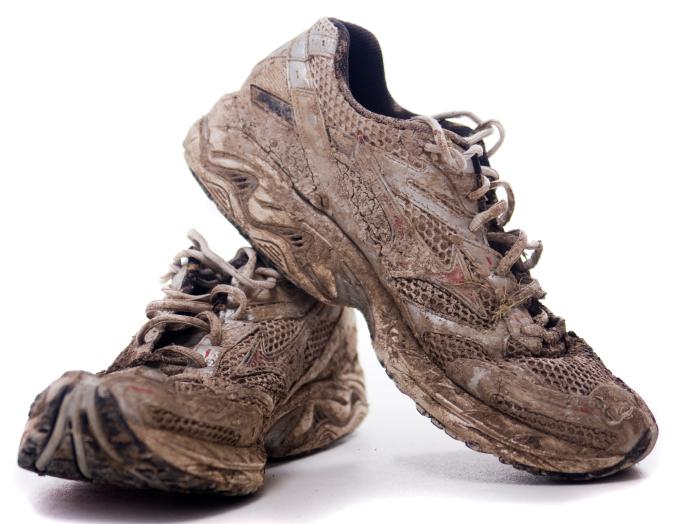 Muddy sneakers. Muddy sneakers.