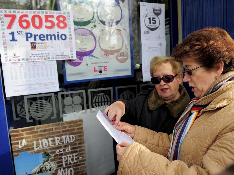 Women in Barcelona check their numbers for Spain's Christmas lottery, named "El Gordo" (Fat One), in 2012. Women in Barcelona check their numbers for Spain's Christmas lottery, named "El Gordo" (Fat One), in 2012.