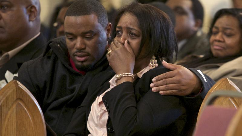 Shirley Chambers cries during Monday's funeral for her son Ronnie Chambers, 33. She had four children, three boys and a girl, all victims of gun violence in Chicago over a period of 18 years. Shirley Chambers cries during Monday's funeral for her son Ronnie Chambers, 33. She had four children, three boys and a girl, all victims of gun violence in Chicago over a period of 18 years.