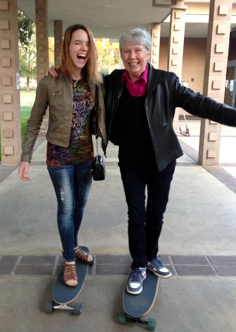 Harvey Mudd President Maria Klawe often uses her longboard to get around campus and chat with students like senior Xanda Schofield. Harvey Mudd President Maria Klawe often uses her longboard to get around campus and chat with students like senior Xanda Schofield.