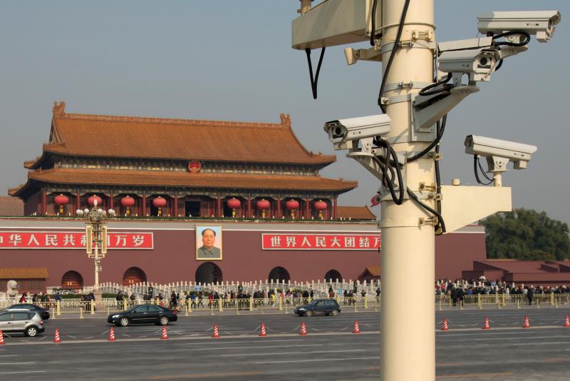 The use of security cameras such as these, looking out over Tiananmen Square in Beijing, is on the rise in China. Critics say the government is using them to discourage dissidents. The use of security cameras such as these, looking out over Tiananmen Square in Beijing, is on the rise in China. Critics say the government is using them to discourage dissidents.