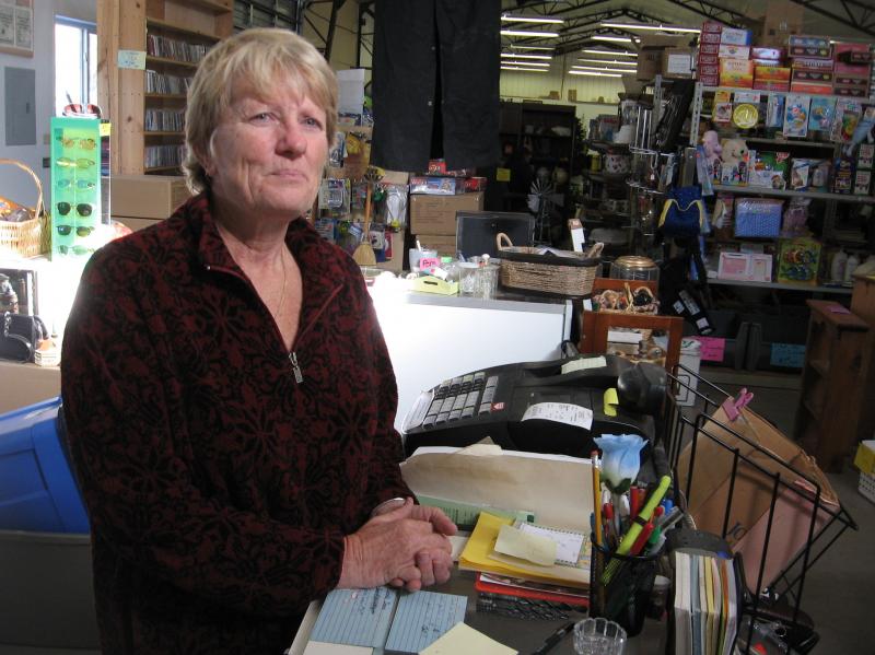 Lela Petersen, owner of the Anything And Everything store in Flagler, Colo., expects the cost of health insurance for her and her husband to drop by my more than half next year. Lela Petersen, owner of the Anything And Everything store in Flagler, Colo., expects the cost of health insurance for her and her husband to drop by my more than half next year.