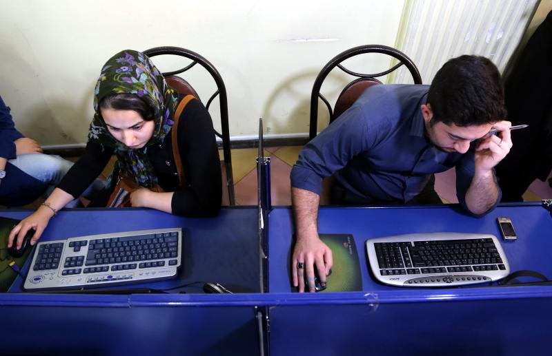 Iranians surf the web at an Internet cafe in Tehran on April 28, 2013. The recently elected president, Hasan Rowhani, has suggested that he may loosen restrictions on the Internet. Iranians surf the web at an Internet cafe in Tehran on April 28, 2013. The recently elected president, Hasan Rowhani, has suggested that he may loosen restrictions on the Internet.