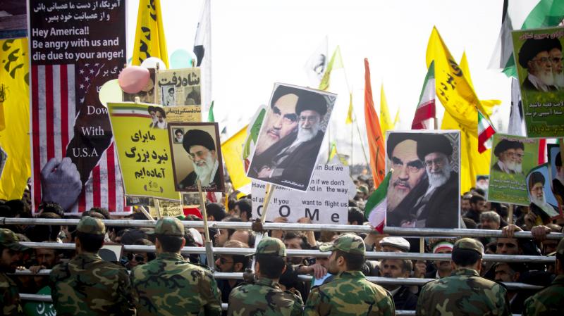 Iranians hold pictures of Iran's current supreme leader, Ayatollah Ali Khamenei, during the 35th anniversary of the 1979 Islamic Revolution in Tehran, Iran, on Tuesday. Iranians hold pictures of Iran's current supreme leader, Ayatollah Ali Khamenei, during the 35th anniversary of the 1979 Islamic Revolution in Tehran, Iran, on Tuesday.