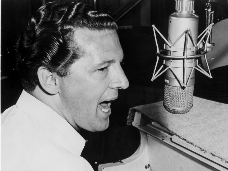 Jerry Lee Lewis shot to fame in the 1950s with hits such as "A Whole Lotta Shakin' Goin' On" and "Great Balls of Fire." Jerry Lee Lewis shot to fame in the 1950s with hits such as "A Whole Lotta Shakin' Goin' On" and "Great Balls of Fire."