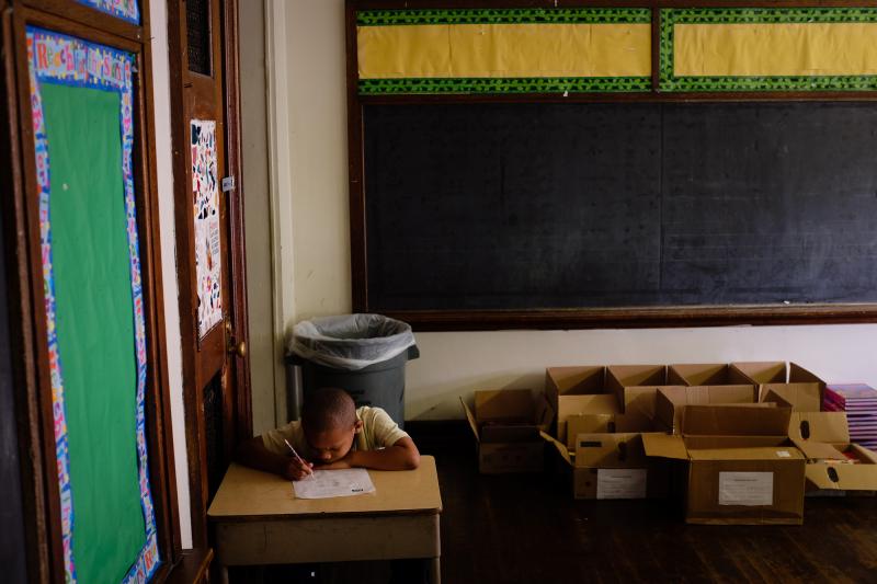 Third-grader Kassim West last July at Walter G. Smith Elementary School, one of more than 20 Philadelphia public schools that closed at the end of the school year. Third-grader Kassim West last July at Walter G. Smith Elementary School, one of more than 20 Philadelphia public schools that closed at the end of the school year.