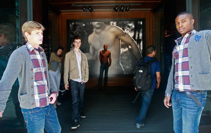 A model at the front entrance to the Abercrombie & Fitch flagship store in New York City. A model at the front entrance to the Abercrombie & Fitch flagship store in New York City.