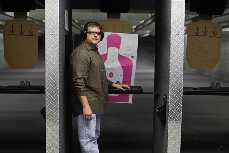 Gun enthusiast Paul Gwaltney at Blue Ridge Arsenal, in Chantilly, Va. Gwaltney, an NPR listener, agreed to host a discussion about guns with friends and colleagues. Gun enthusiast Paul Gwaltney at Blue Ridge Arsenal, in Chantilly, Va. Gwaltney, an NPR listener, agreed to host a discussion about guns with friends and colleagues.