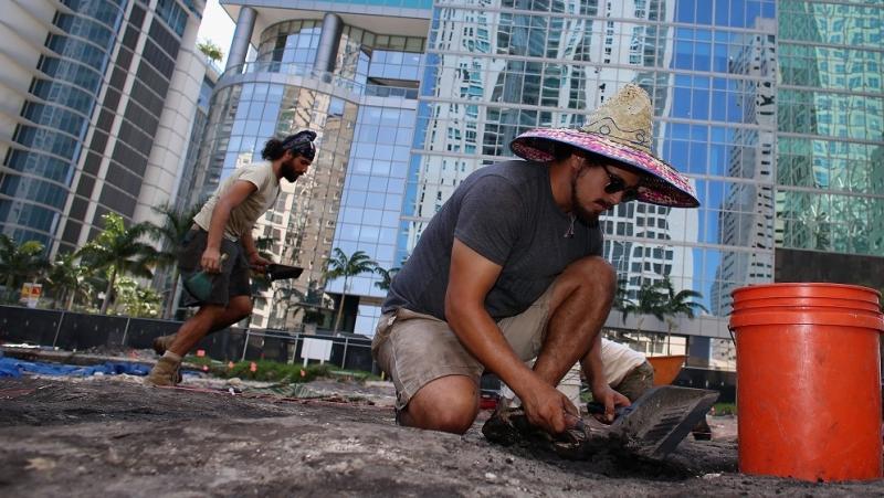In the middle of downtown Miami, archaeologists excavate a site holding evidence of a more than 1,000-year-old Tequesta Indian village. In the middle of downtown Miami, archaeologists excavate a site holding evidence of a more than 1,000-year-old Tequesta Indian village.