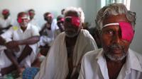 Patients sit with their eyes bandaged at an Aravind Eye Care clinic in Madurai, India after cataract surgeries. Aravind performs more than 300,000 cataract surgeries annually. Patients sit with their eyes bandaged at an Aravind Eye Care clinic in Madurai, India after cataract surgeries. Aravind performs more than 300,000 cataract surgeries annually.