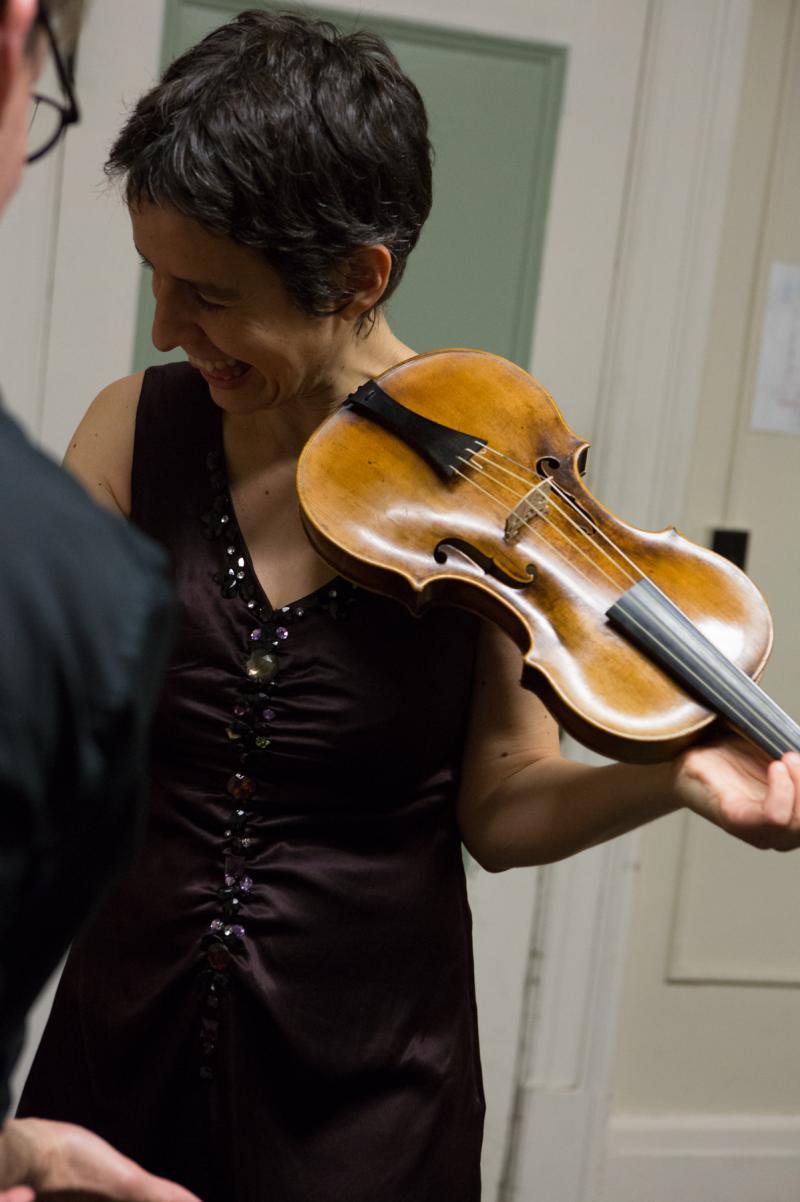 Violinist Amandine Beyer holds Mozart's own violin backstage at Boston's Jordan Hall on Monday. Violinist Amandine Beyer holds Mozart's own violin backstage at Boston's Jordan Hall on Monday.