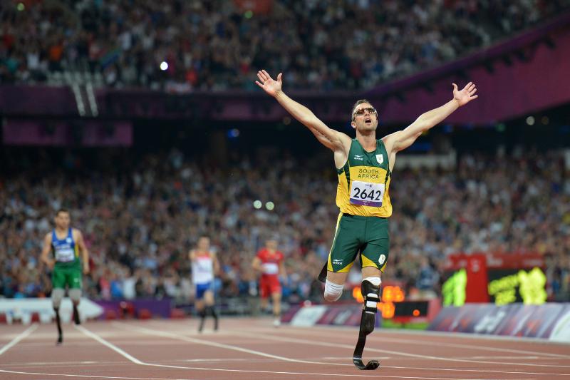 Oscar Pistorius, seen here at the London 2012 Paralympic Games, made history as the first double leg amputee to race in the Summer Olympics. He now faces charges that he murdered his girlfriend. Oscar Pistorius, seen here at the London 2012 Paralympic Games, made history as the first double leg amputee to race in the Summer Olympics. He now faces charges that he murdered his girlfriend.