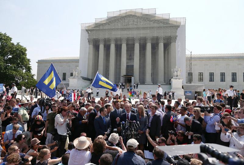 One of the attorneys in the California Proposition 8 case, David Boies (center), speaks outside the Supreme Court as he's surrounded by plaintiffs in the case, couples Paul Katami (from left) and Jeff Zarrillo, and Sandy Stier and Kris Perry. One of the attorneys in the California Proposition 8 case, David Boies (center), speaks outside the Supreme Court as he's surrounded by plaintiffs in the case, couples Paul Katami (from left) and Jeff Zarrillo, and Sandy Stier and Kris Perry.