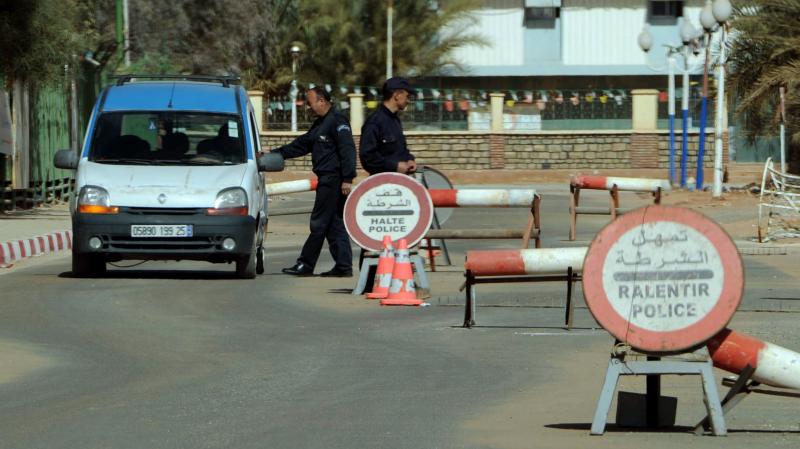 Algerian police stop cars at a checkpoint in In Amenas, deep in the Sahara near the Libyan border, on Jan. 18. Islamists took hostages at a nearby gas field in a major international incident. Algerian police stop cars at a checkpoint in In Amenas, deep in the Sahara near the Libyan border, on Jan. 18. Islamists took hostages at a nearby gas field in a major international incident.