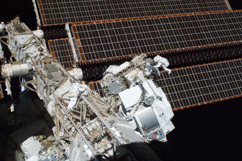 Astronauts work to install the alpha magnetic spectrometer on the International Space Station on May 26, 2011. Astronauts work to install the alpha magnetic spectrometer on the International Space Station on May 26, 2011.