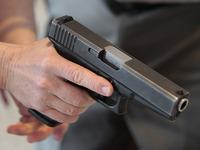 A Utah teacher is shown how to handle a handgun by instructor Clint Simon at a concealed-weapons training class Dec. 27 in West Valley City, Utah. A Utah teacher is shown how to handle a handgun by instructor Clint Simon at a concealed-weapons training class Dec. 27 in West Valley City, Utah.