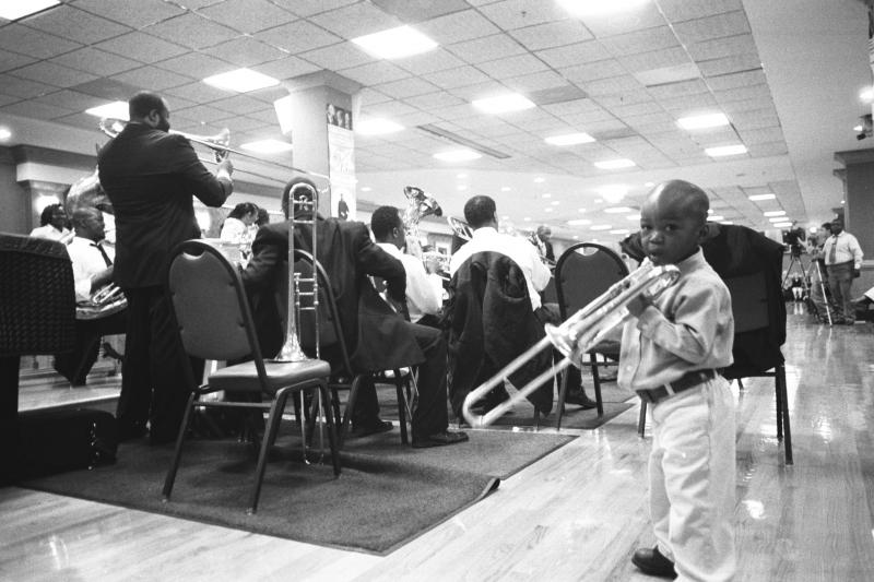 Cedric Mangum (left) leads a shout band as a junior member looks on. Cedric Mangum (left) leads a shout band as a junior member looks on.