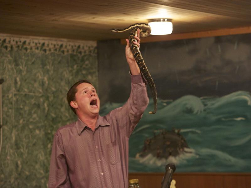 Andrew Hamblin preaches while holding a snake above his head, LaFollette, Tenn. Andrew Hamblin preaches while holding a snake above his head, LaFollette, Tenn.