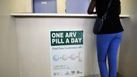 A woman waits to get AIDS drugs on April 8 at a clinic in Ga-Rankuwa, South Africa, about 55 miles north of Johannesburg. New WHO guidelines say patients should start HIV treatment much earlier, before they become extremely sick. A woman waits to get AIDS drugs on April 8 at a clinic in Ga-Rankuwa, South Africa, about 55 miles north of Johannesburg. New WHO guidelines say patients should start HIV treatment much earlier, before they become extremely sick.