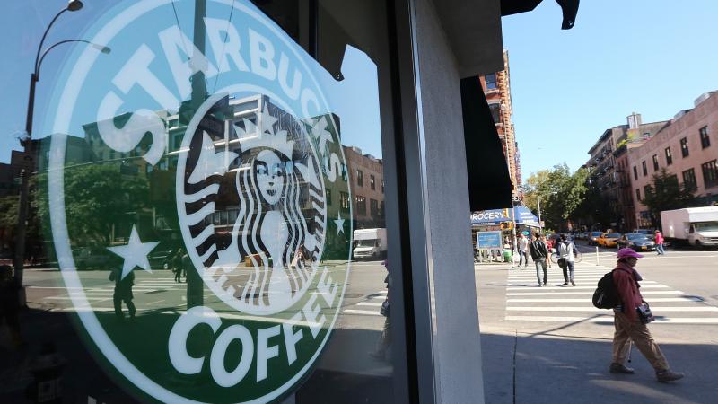 Seattle coffee giant Starbucks says the company will hire at least 10,000 veterans or their spouses over the next five years. Seattle coffee giant Starbucks says the company will hire at least 10,000 veterans or their spouses over the next five years.