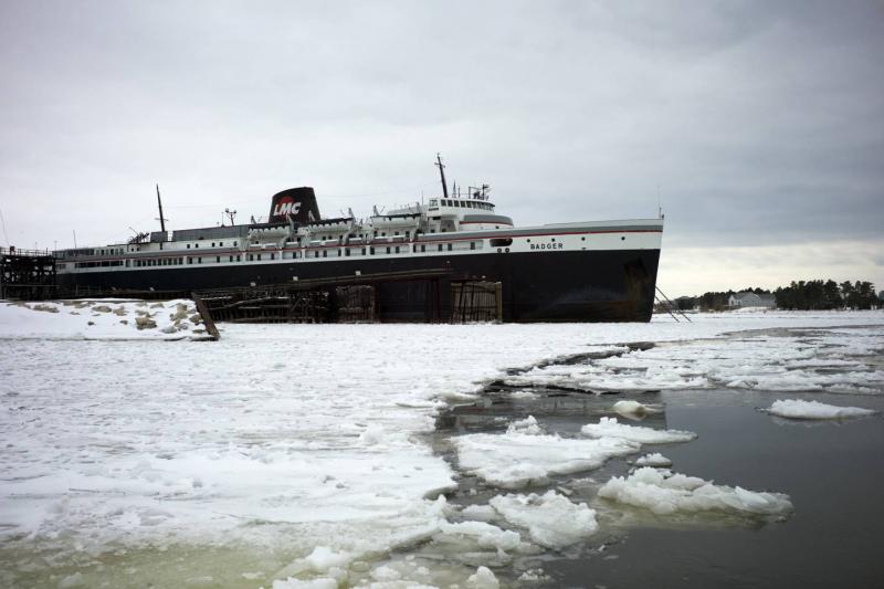 The nation's last coal-burning ferry, the SS Badger, sits on Lake Michigan in the port town of Ludington, Mich. The EPA permit that has long allowed the ship to dump coal ash into the lake is now under review. The nation's last coal-burning ferry, the SS Badger, sits on Lake Michigan in the port town of Ludington, Mich. The EPA permit that has long allowed the ship to dump coal ash into the lake is now under review.