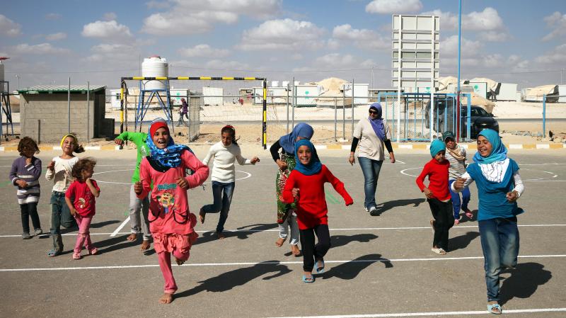 Children play at the Zaatari refugee camp in Jordan, where more than 120,000 Syrian refugees live. Roughly two-thirds are kids, many of whom have been traumatized by the violence in their homeland. Children play at the Zaatari refugee camp in Jordan, where more than 120,000 Syrian refugees live. Roughly two-thirds are kids, many of whom have been traumatized by the violence in their homeland.