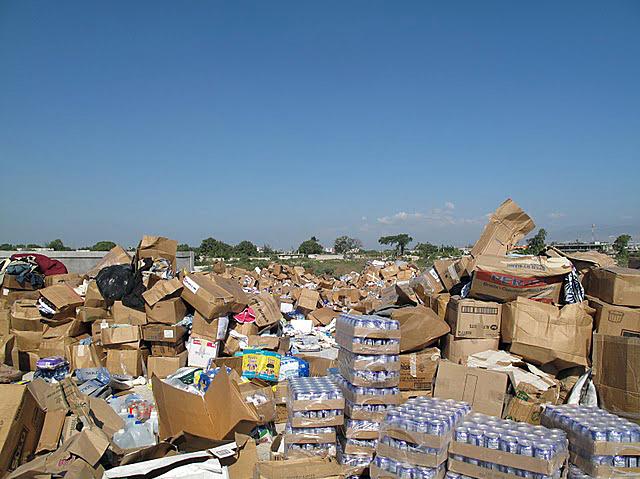 Unsolicited donations of used clothing, bottled water, canned food and personal grooming products piled up following the 2010 earthquake in Haiti. The piles had to be moved aside to make room to stage and deliver critical relief supplies. Unsolicited donations of used clothing, bottled water, canned food and personal grooming products piled up following the 2010 earthquake in Haiti. The piles had to be moved aside to make room to stage and deliver critical relief supplies.