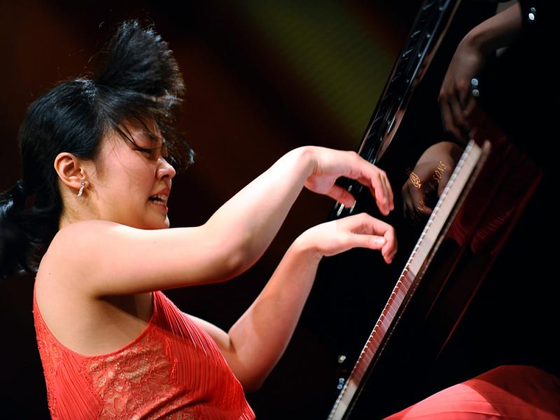 Chinese pianist Fei-Fei Dong, 22, performs at the 14th Van Cliburn International Piano Competition in Fort Worth, Texas. The Juilliard School graduate student is among six musicians chosen for the final round. Chinese pianist Fei-Fei Dong, 22, performs at the 14th Van Cliburn International Piano Competition in Fort Worth, Texas. The Juilliard School graduate student is among six musicians chosen for the final round.