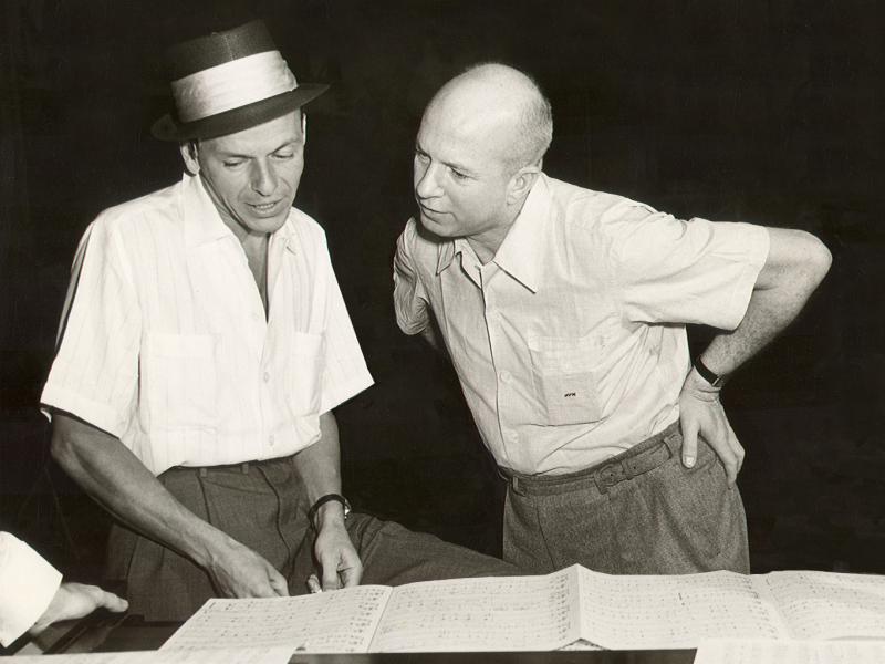 Jimmy Van Heusen with Frank Sinatra in the 1950s. Van Heusen wrote dozens of songs for the crooner and became Sinatra's close friend and confidant. Jimmy Van Heusen with Frank Sinatra in the 1950s. Van Heusen wrote dozens of songs for the crooner and became Sinatra's close friend and confidant.