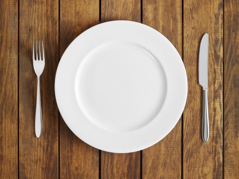 A plate, fork and knife A plate, fork and knife