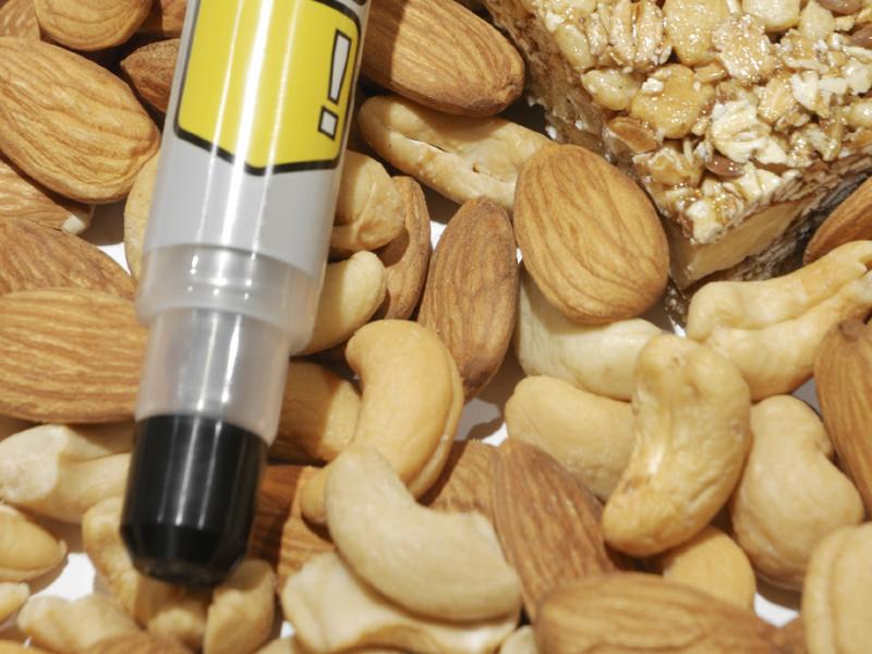 Epipen with nuts. Epipen with nuts.