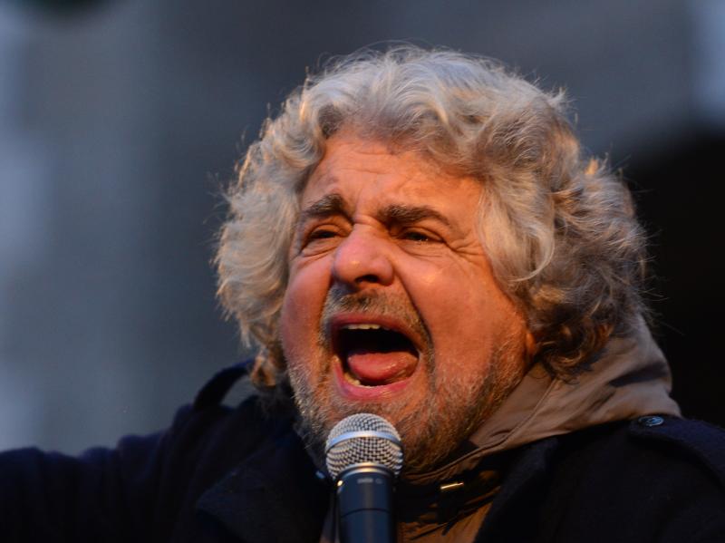 Comedian-turned-politician Beppe Grillo addresses supporters at a rally on Feb. 12 in Bergamo, Italy. Many pollsters say his populist Five Star Movement could come in third in this weekend's election. Comedian-turned-politician Beppe Grillo addresses supporters at a rally on Feb. 12 in Bergamo, Italy. Many pollsters say his populist Five Star Movement could come in third in this weekend's election.