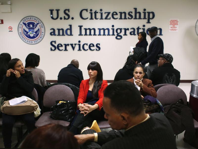 Immigrants wait for their citizenship interviews at the U.S. Citizenship and Immigration Services on Jan. 29. Immigrants wait for their citizenship interviews at the U.S. Citizenship and Immigration Services on Jan. 29.