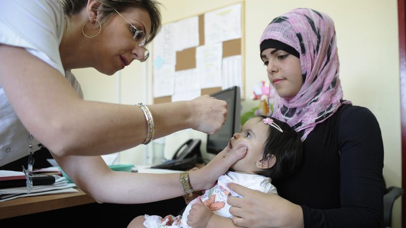 In early August, Israel launched a mass campaign to vaccinate children against polio, including this little girl at a clinic in Rahat. In early August, Israel launched a mass campaign to vaccinate children against polio, including this little girl at a clinic in Rahat.