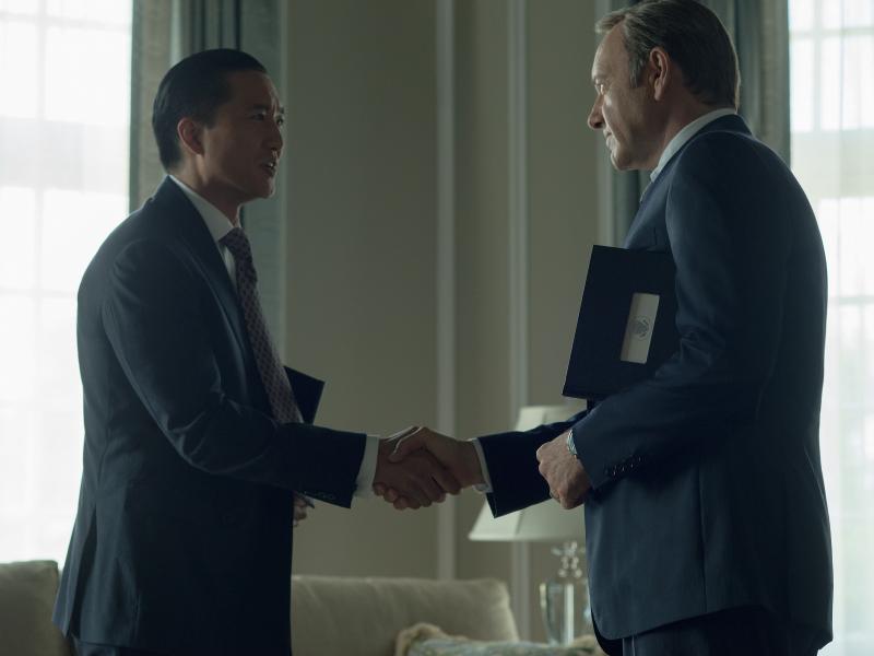 Chinese billionaire Xander Feng, played by Terry Chen, shakes hands with Francis Underwood, played by Kevin Spacey, in Netflix's House of Cards. Chinese billionaire Xander Feng, played by Terry Chen, shakes hands with Francis Underwood, played by Kevin Spacey, in Netflix's House of Cards.