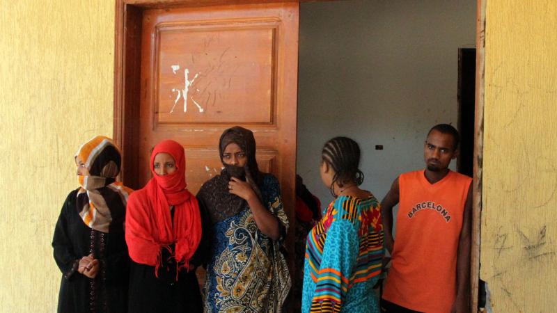 Illegal immigrants captured in the Libyan coastal city of Surman are held at a temporary prison in an eastern district of Tripoli, Libya, on Oct. 19. Illegal immigrants captured in the Libyan coastal city of Surman are held at a temporary prison in an eastern district of Tripoli, Libya, on Oct. 19.