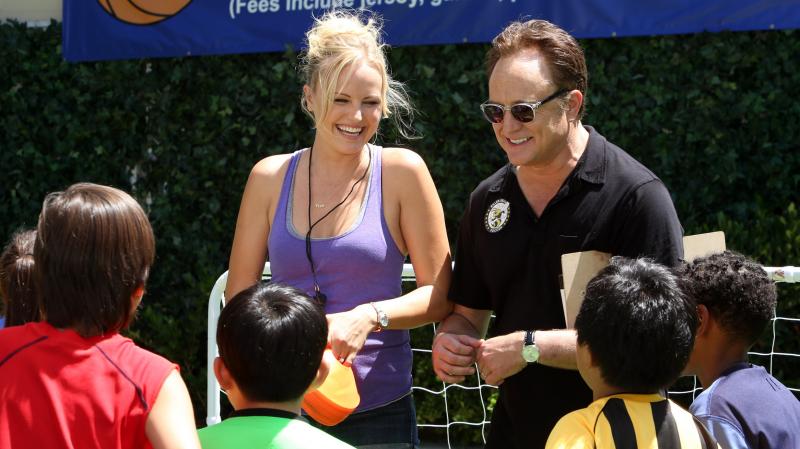 Kate (Malin Akerman) pitches in alongside husband Pete (Bradley Whitford) on her stepson's soccer practice in ABC's Trophy Wife. Kate (Malin Akerman) pitches in alongside husband Pete (Bradley Whitford) on her stepson's soccer practice in ABC's Trophy Wife.