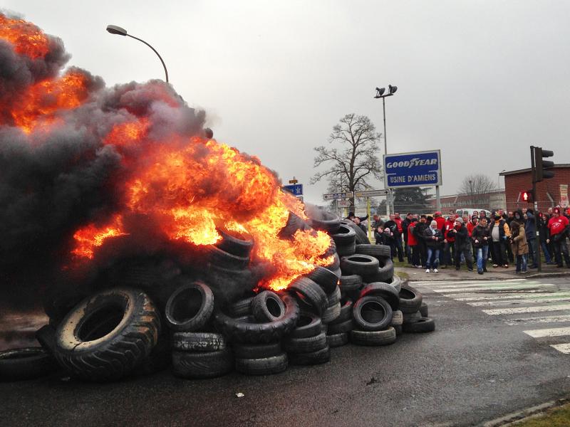 French workers burn tires outside the Goodyear tire factory in Amiens, France, on Tuesday, after Titan CEO Maurice Taylor criticized French workers in a letter addressed to Industrial Renewal Minister Arnaud Montebourg. French workers burn tires outside the Goodyear tire factory in Amiens, France, on Tuesday, after Titan CEO Maurice Taylor criticized French workers in a letter addressed to Industrial Renewal Minister Arnaud Montebourg.