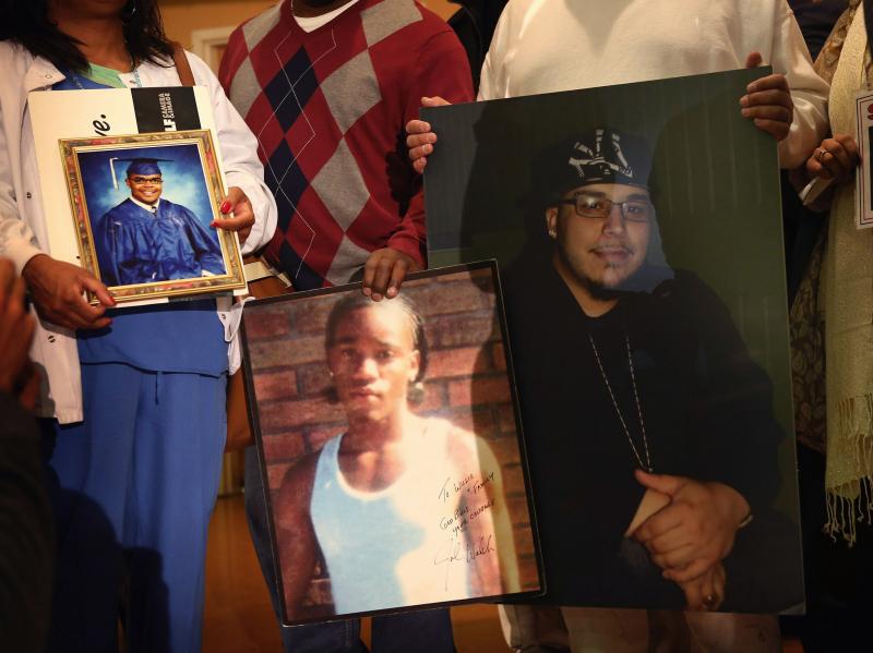 Community leaders and family members of murder victims attend a press conference Jan. 3 at St. Sabina Church in Chicago to make a plea for stronger gun regulations. Community leaders and family members of murder victims attend a press conference Jan. 3 at St. Sabina Church in Chicago to make a plea for stronger gun regulations.