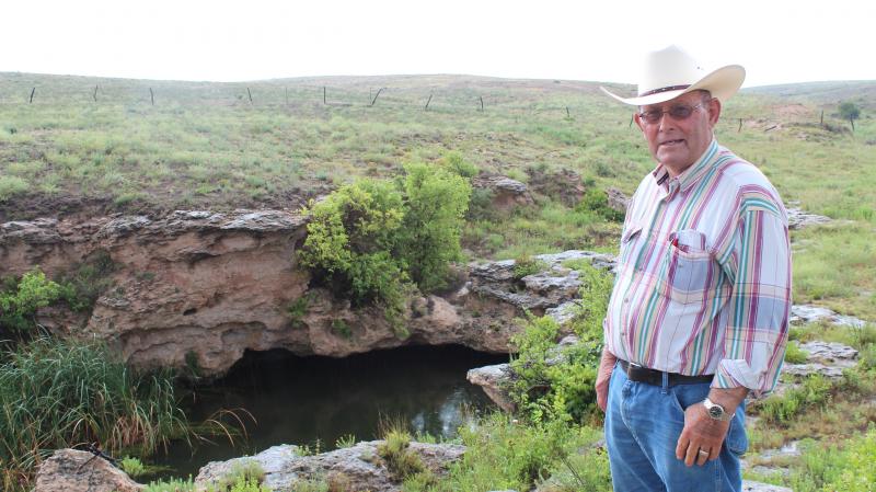 Nate Pike fears that wells, like this one that supplies his ranch with water, will dry up completely after years of water pumping and irrigation in Kansas. Nate Pike fears that wells, like this one that supplies his ranch with water, will dry up completely after years of water pumping and irrigation in Kansas.