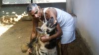 Prakash Amte, pictured with his dog, founded a clinic and a school in a remote jungle in the center of India. Prakash Amte, pictured with his dog, founded a clinic and a school in a remote jungle in the center of India.
