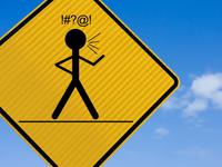 Road sign showing man swearing. Road sign showing man swearing.