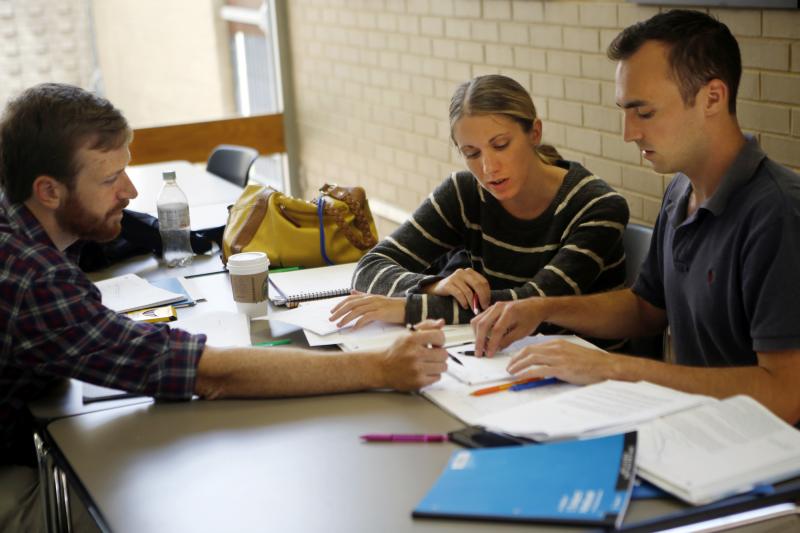 From left, Garrett Berntsen, Jennifer Majer and William Shields compare notes at The Johns Hopkins University School of Advanced International Studies in Washington, D.C. Twenty-somethings have new choices under Obamacare. From left, Garrett Berntsen, Jennifer Majer and William Shields compare notes at The Johns Hopkins University School of Advanced International Studies in Washington, D.C. Twenty-somethings have new choices under Obamacare.