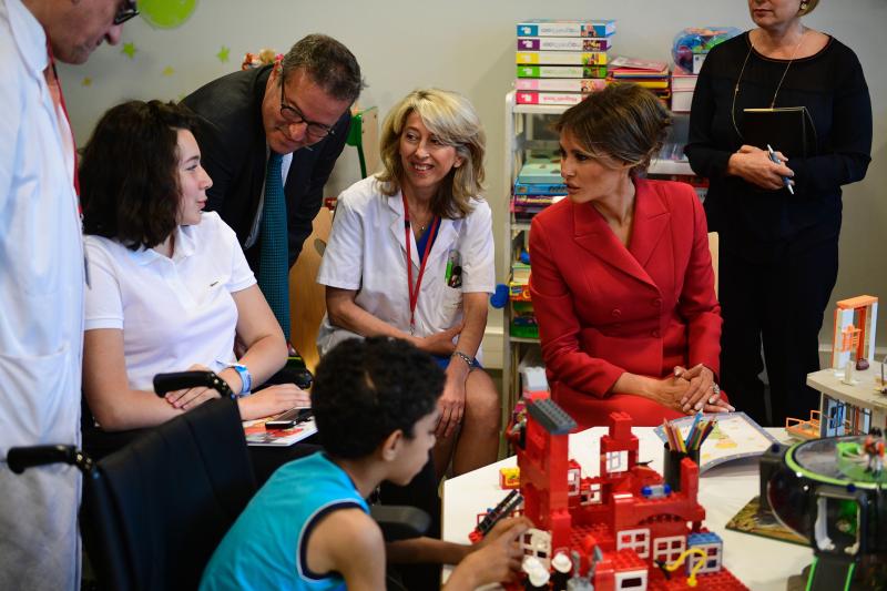 Melania Trump speaks with people during a visit to the Necker Hospital in Paris, on July 13, 2017. Melania Trump speaks with people during a visit to the Necker Hospital in Paris, on July 13, 2017.